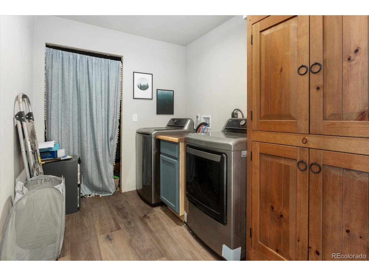 51624 Co Road Villa Grove, CO 81155 - Photo 22 of 50 a kitchen with stainless steel appliances granite countertop a refrigerator and a stove
