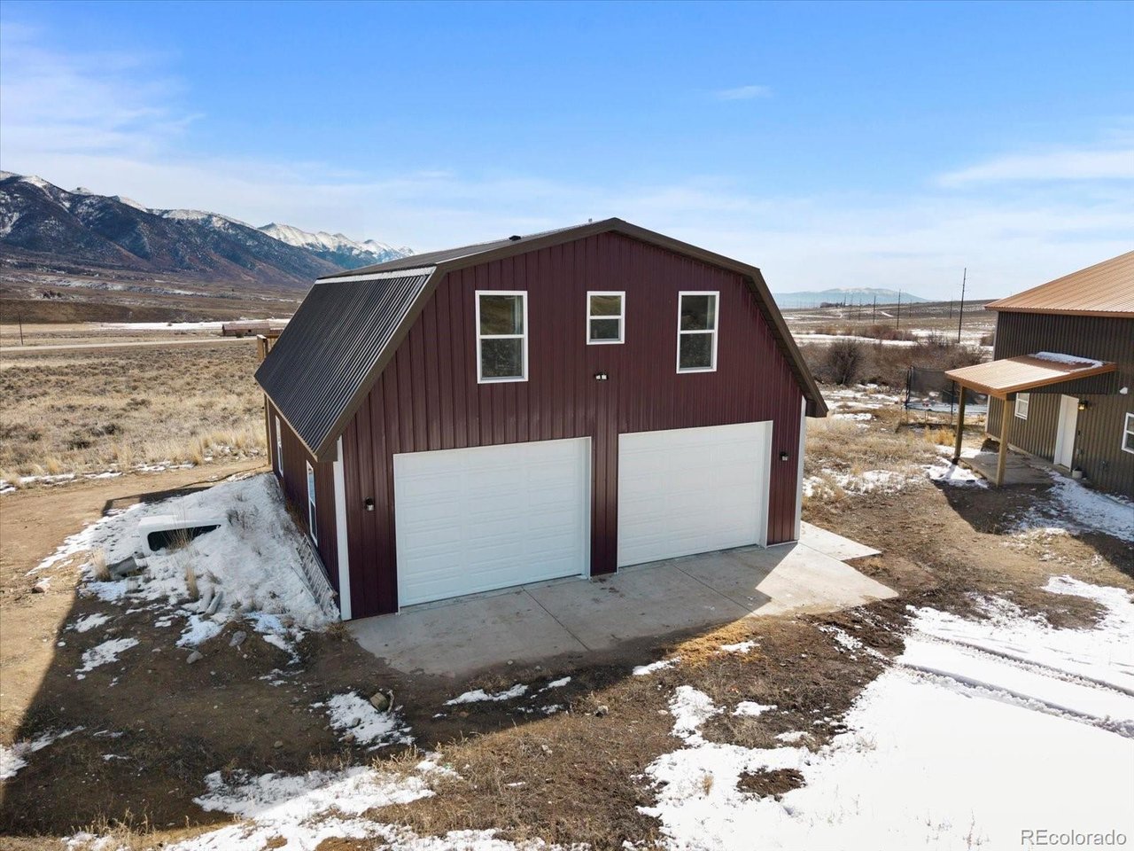 51624 Co Road Villa Grove, CO 81155 - Photo 30 of 50 a front view of a house with a yard