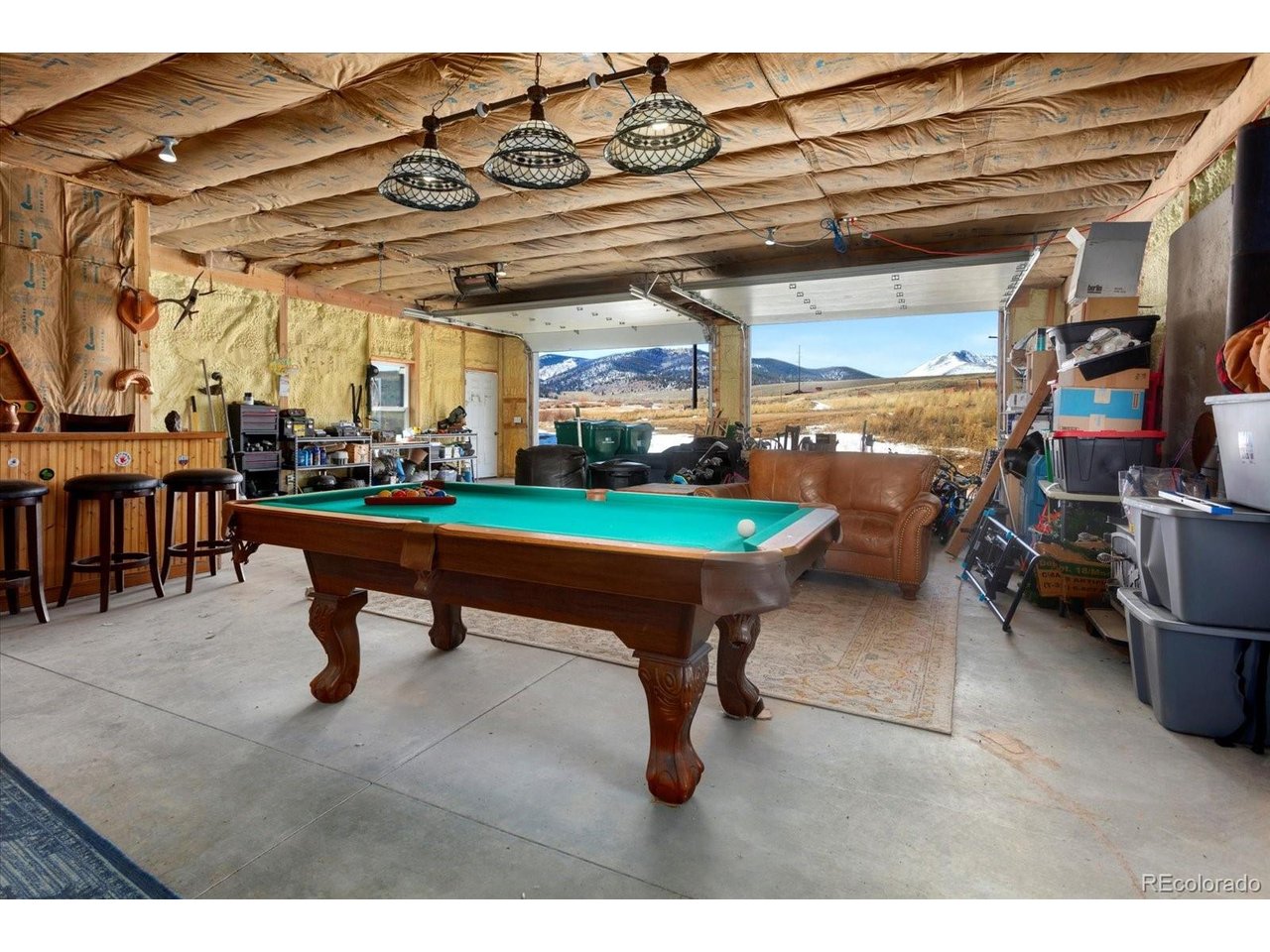 51624 Co Road Villa Grove, CO 81155 - Photo 33 of 50 a room with lots of furniture and a table