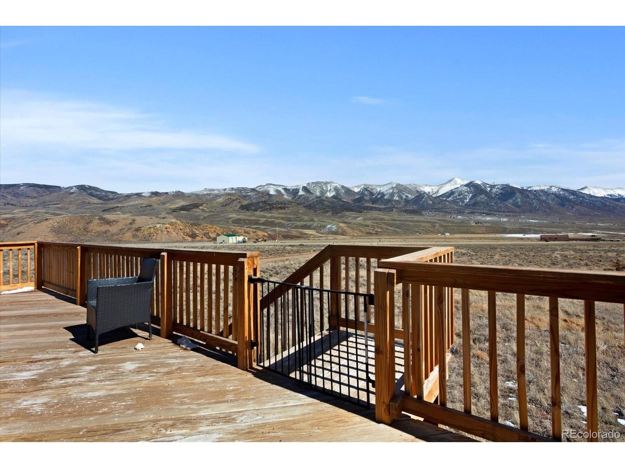 51624 Co Road Villa Grove, CO 81155 - Photo 37 of 50 a view of balcony with wooden floor and a mountain view