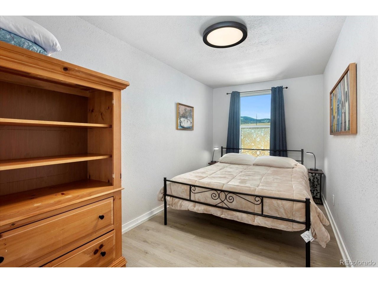 51624 Co Road Villa Grove, CO 81155 - Photo 42 of 50 a bedroom with a bed and a window