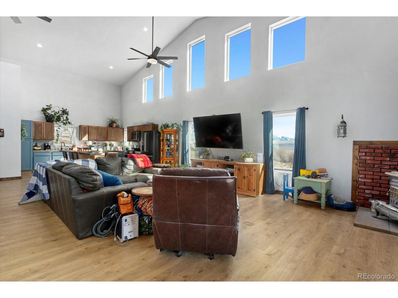 51624 Co Road Villa Grove, CO 81155 - Photo 5 of 50 a living room with furniture and a flat screen tv