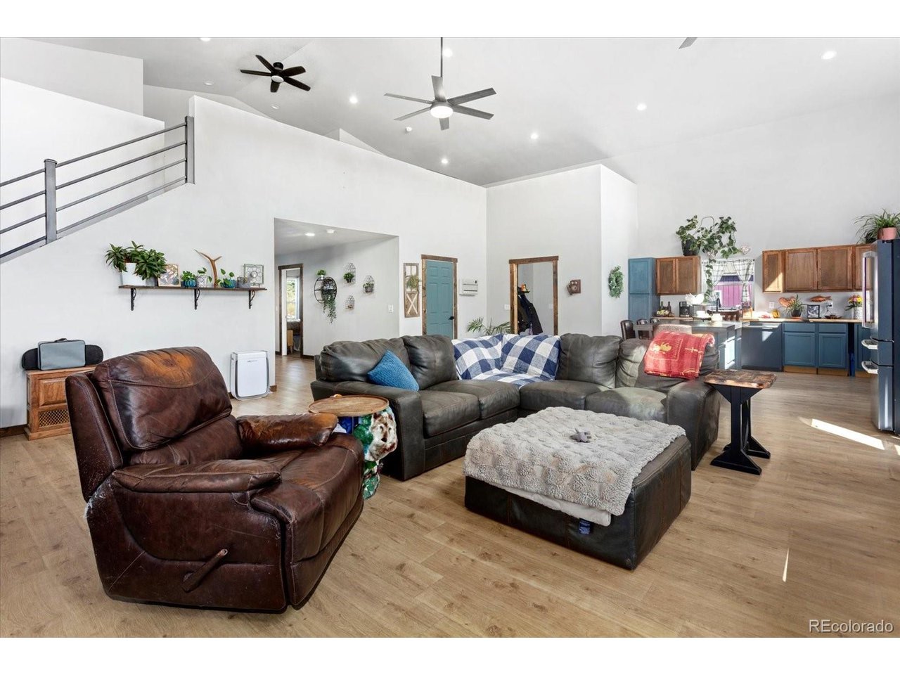 51624 Co Road Villa Grove, CO 81155 - Photo 6 of 50 a living room with furniture and a chandelier