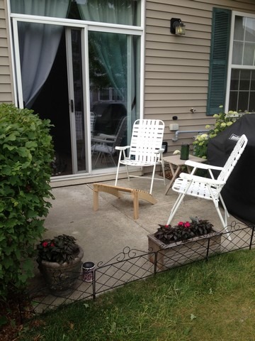 3016 Falling Waters Lane, Unit 3016 Lindenhurst, IL 60046 - Photo 20 of 21 a backyard of a house with yard table and chairs