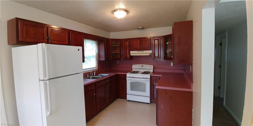 606 Habersham Road High Point, NC 27260 - Photo 9 of 17 Wonderful kitchen with plenty of cabinets and counter space.