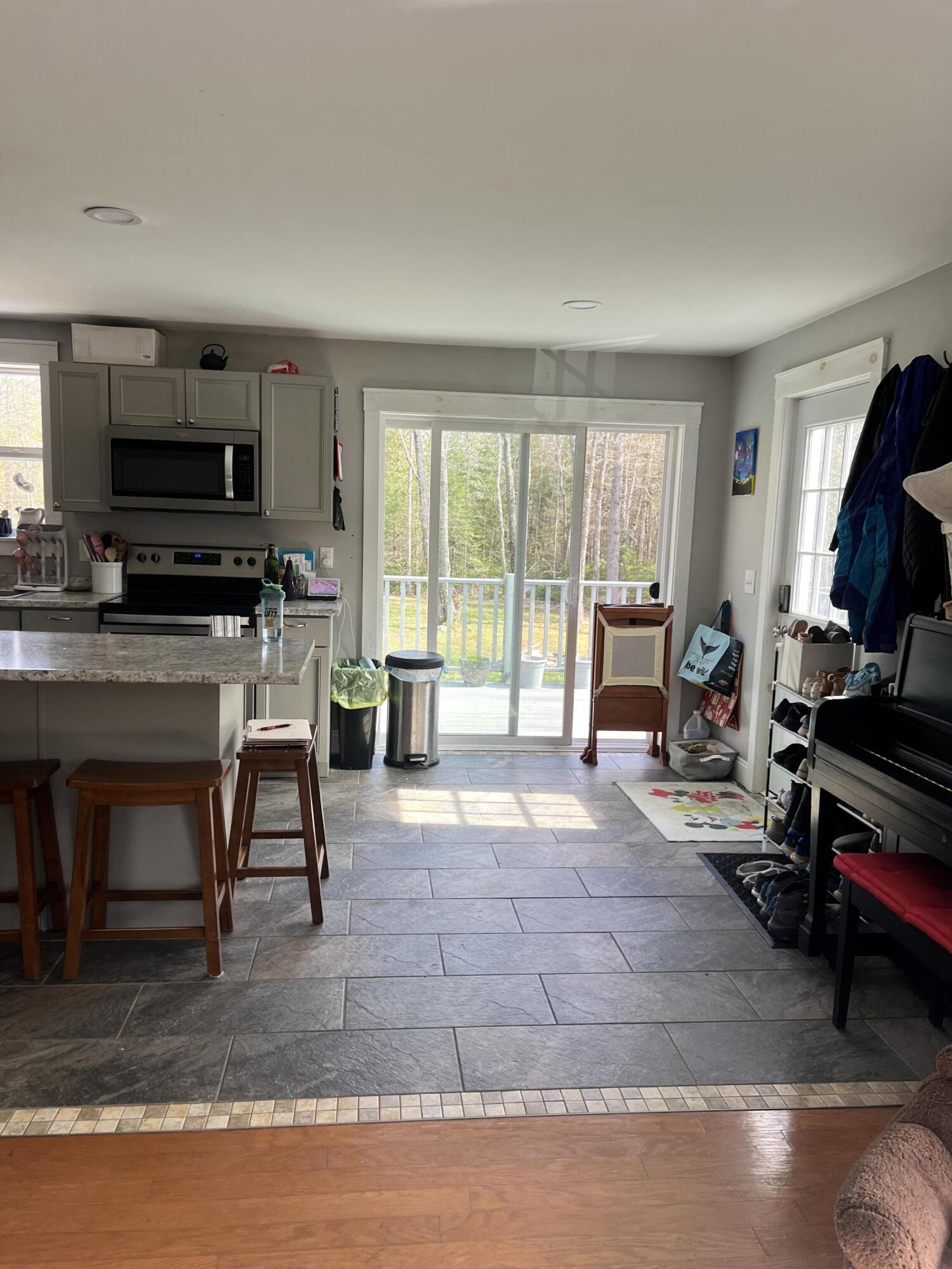 202 Rooks Road Holden, ME 04429 - Photo 9 of 22 kitchen sliding door todeck