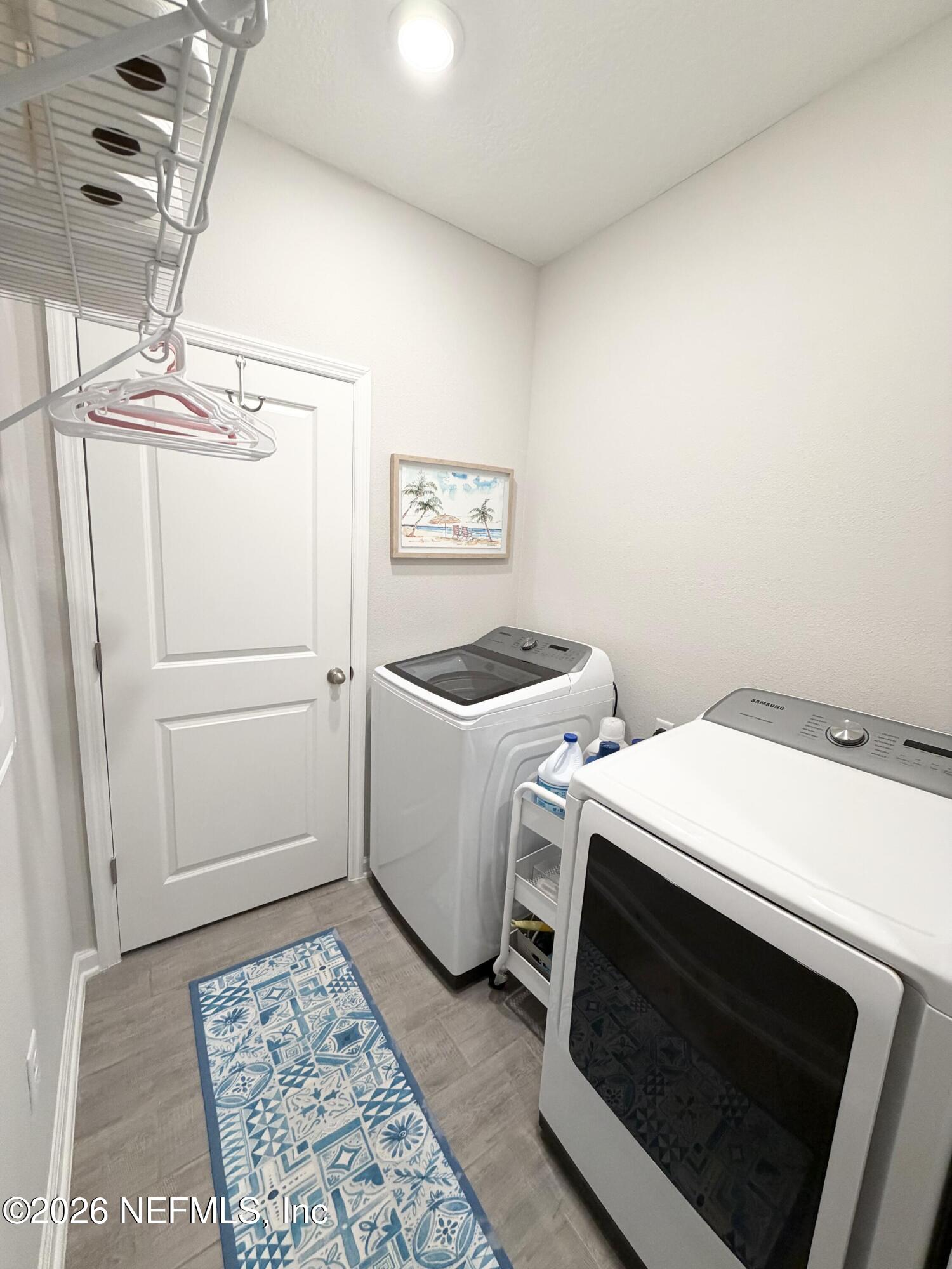 75457 Banyan Way Yulee, FL 32097 - Photo 13 of 36 a utility room with dryer and washer