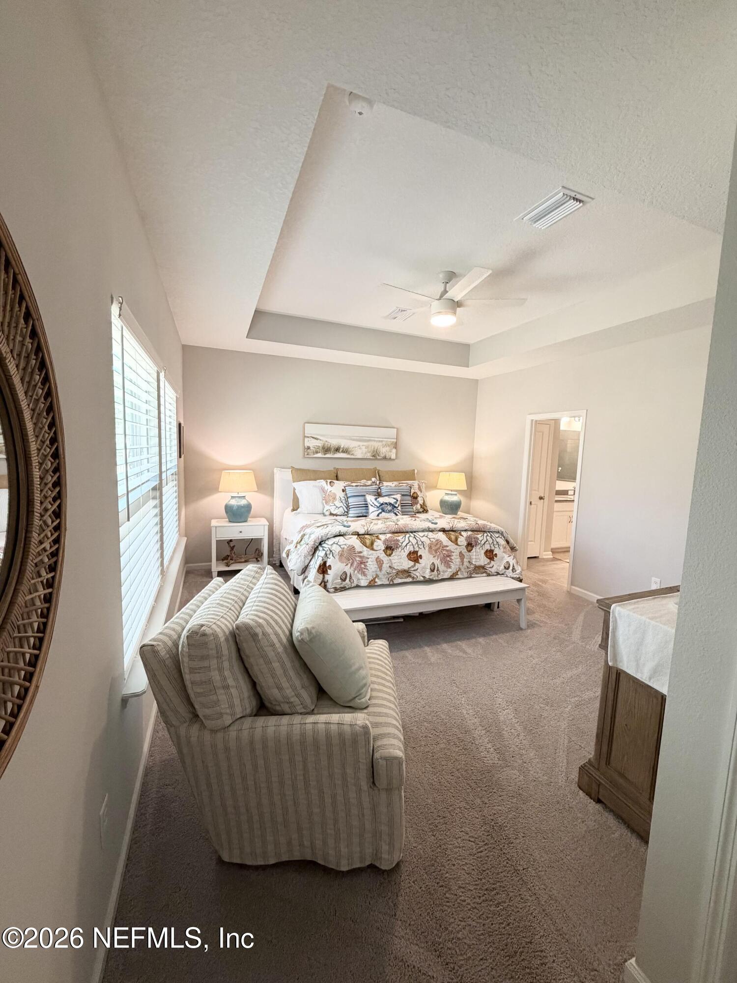 75457 Banyan Way Yulee, FL 32097 - Photo 23 of 36 a living room with furniture and a large window