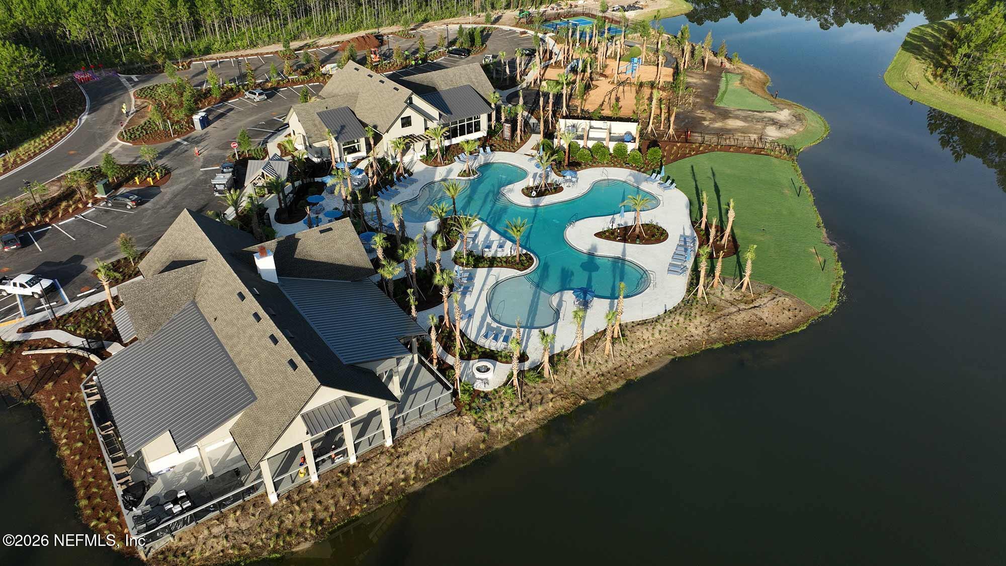 75457 Banyan Way Yulee, FL 32097 - Photo 32 of 36 an aerial view of a residential houses with outdoor space