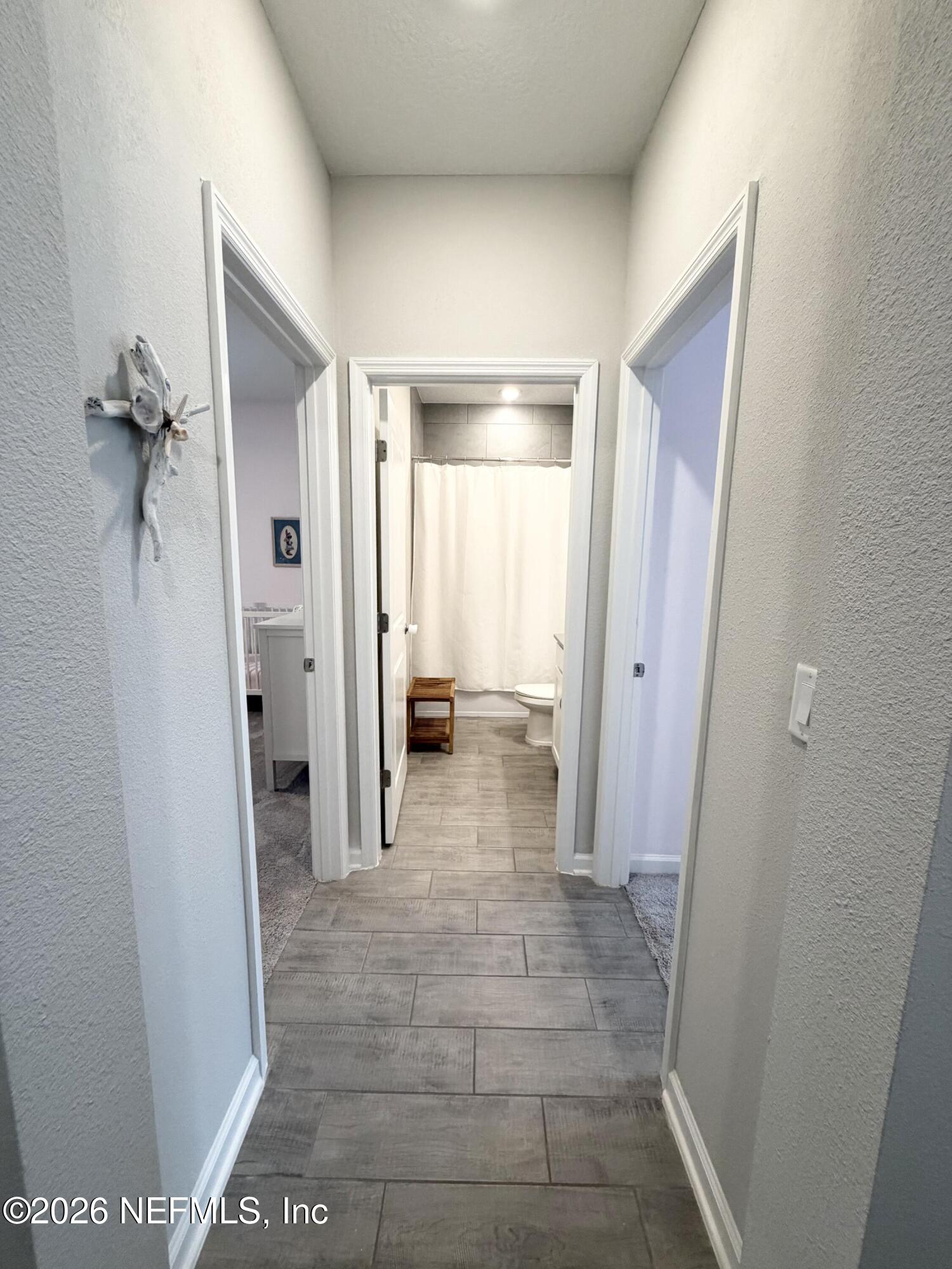 75457 Banyan Way Yulee, FL 32097 - Photo 5 of 36 a view of a hallway