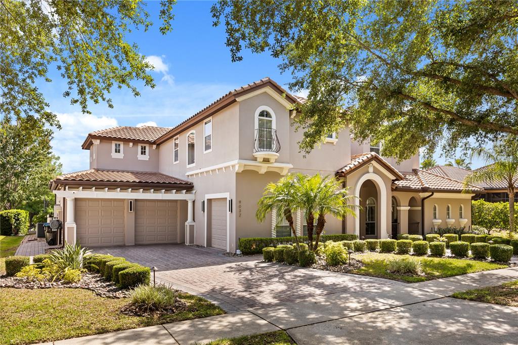 9032 Tavolini Terrace Windermere, FL 34786 - Photo 1 of 1 a front view of a house with garden