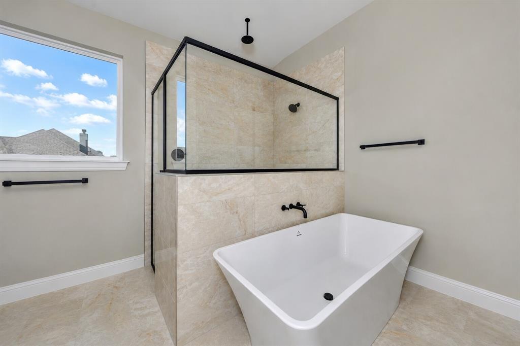 1057 Vh Ranch Poolville, TX 76487 - Photo 19 of 38 a bathroom with a white sink and glass window