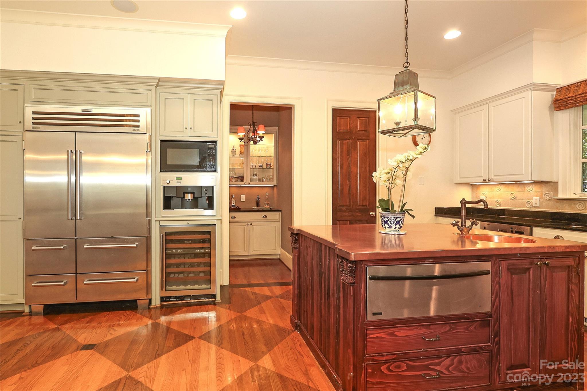 2416 Warburton Road Charlotte, NC 28211 - Photo 12 of 46 a kitchen with stainless steel appliances a sink stove and refrigerator