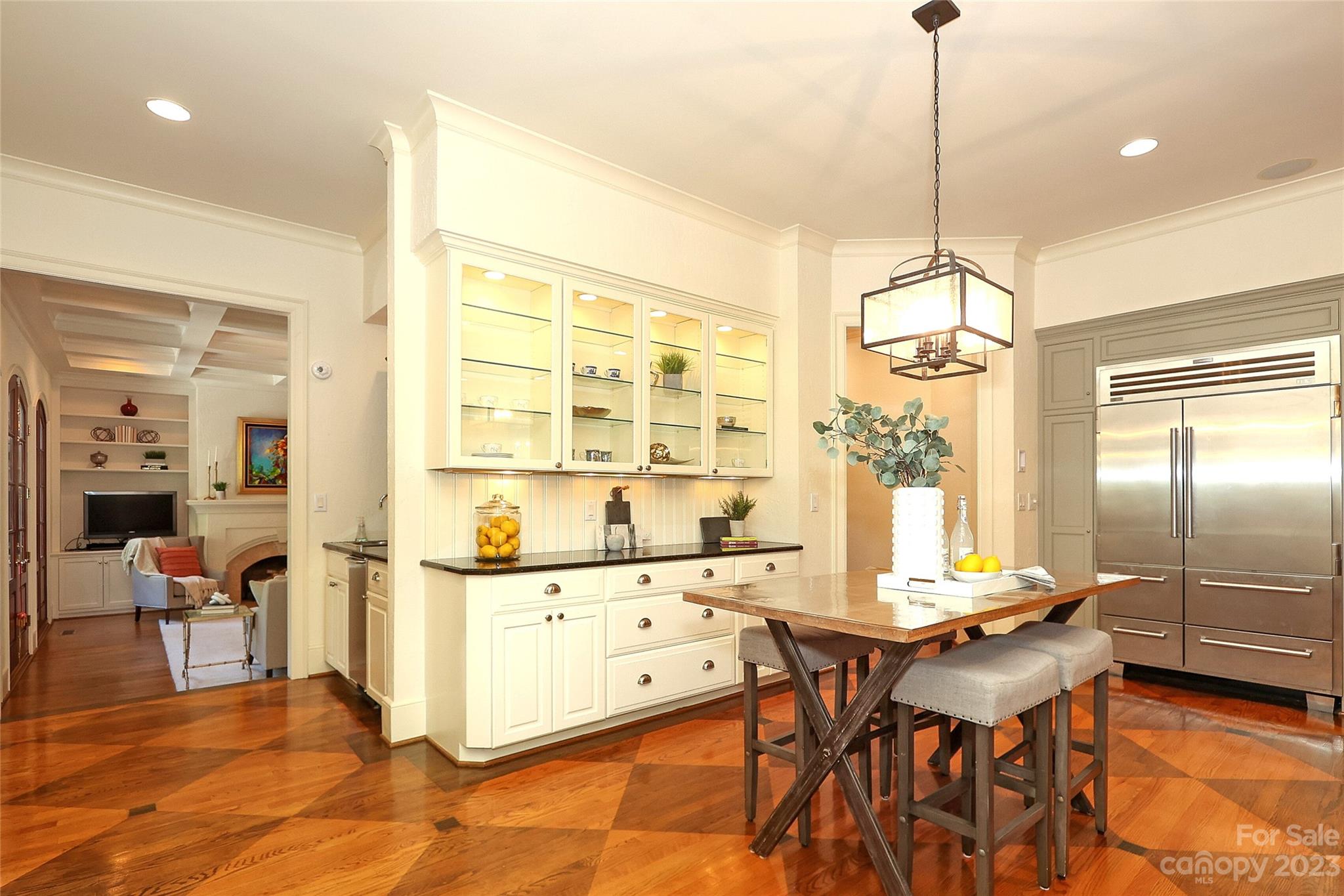2416 Warburton Road Charlotte, NC 28211 - Photo 13 of 46 a view of a dining room with furniture window and wooden floor