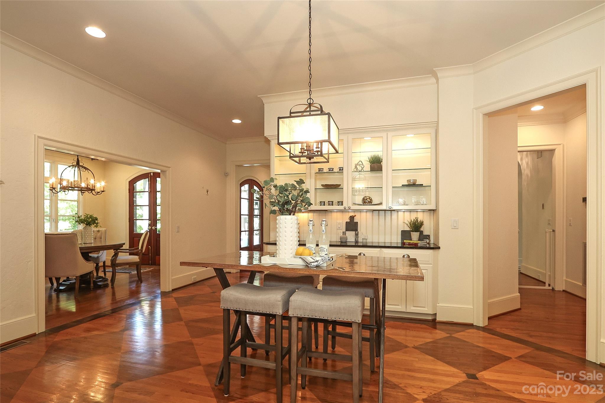 2416 Warburton Road Charlotte, NC 28211 - Photo 15 of 46 a dining room with furniture and wooden floor