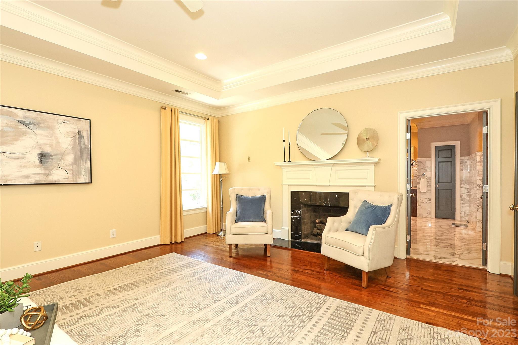 2416 Warburton Road Charlotte, NC 28211 - Photo 23 of 46 a living room with furniture a fireplace and a table