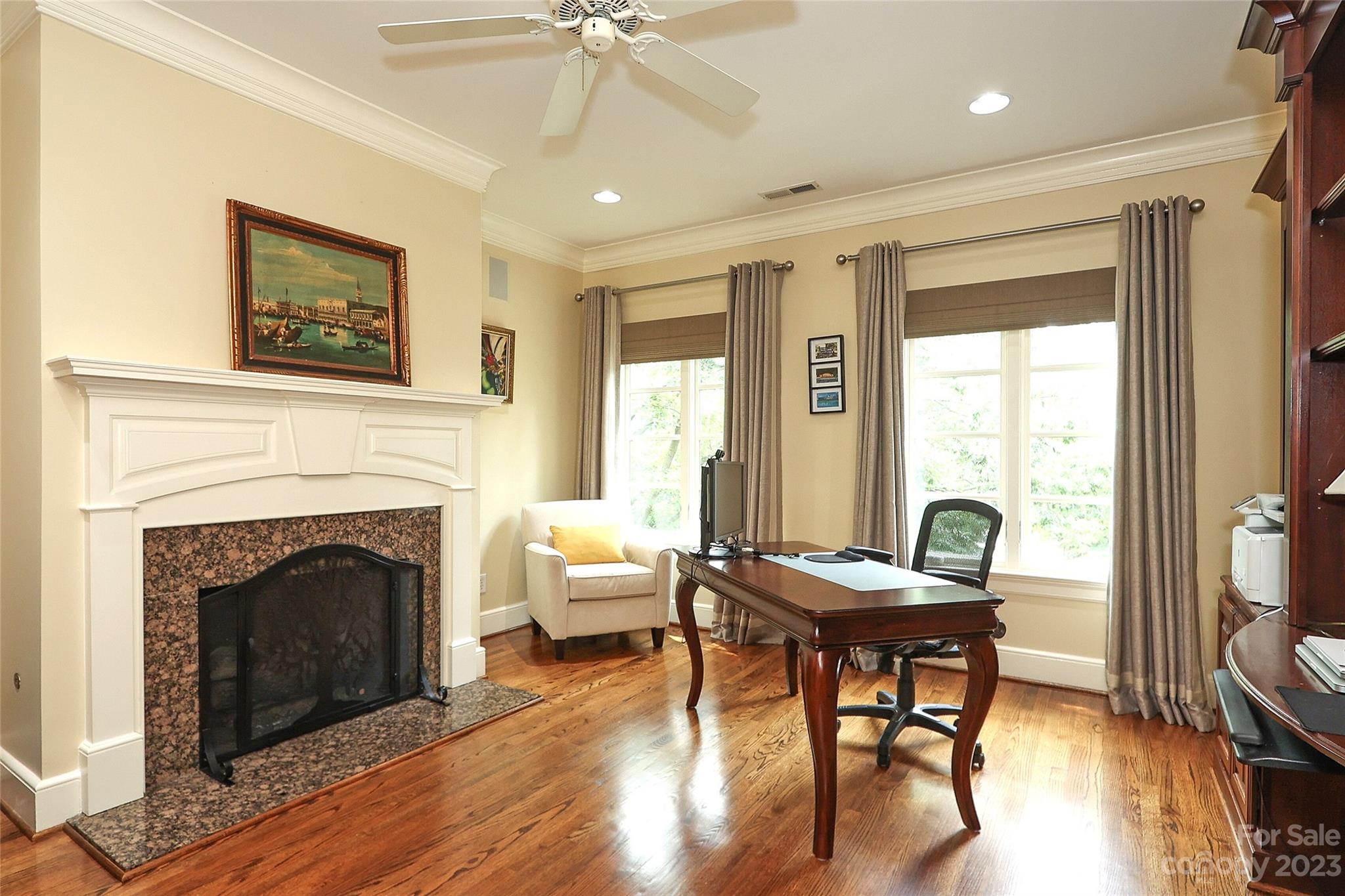 2416 Warburton Road Charlotte, NC 28211 - Photo 28 of 46 a living room with furniture and a fireplace