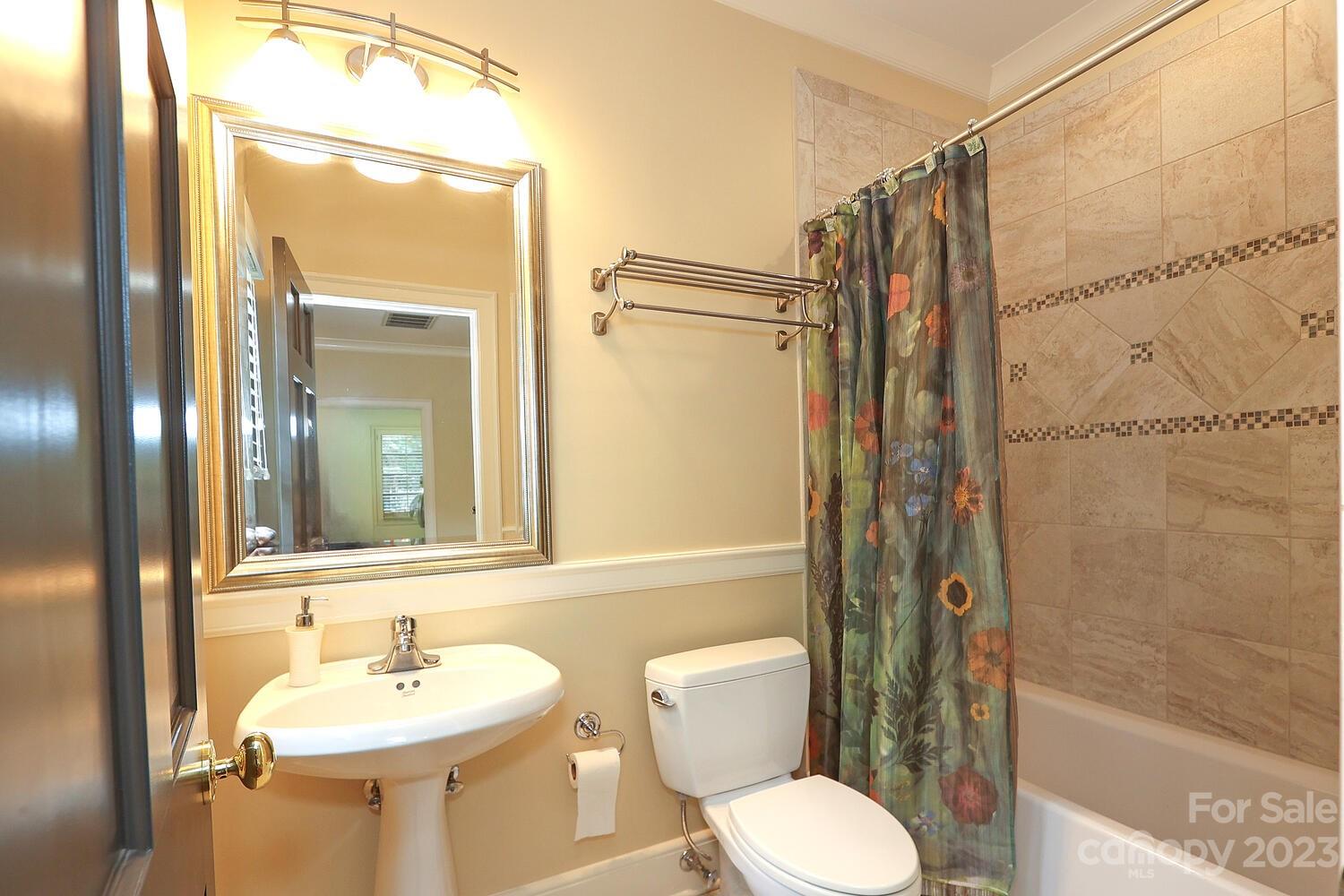 2416 Warburton Road Charlotte, NC 28211 - Photo 32 of 46 a bathroom with a sink toilet and shower