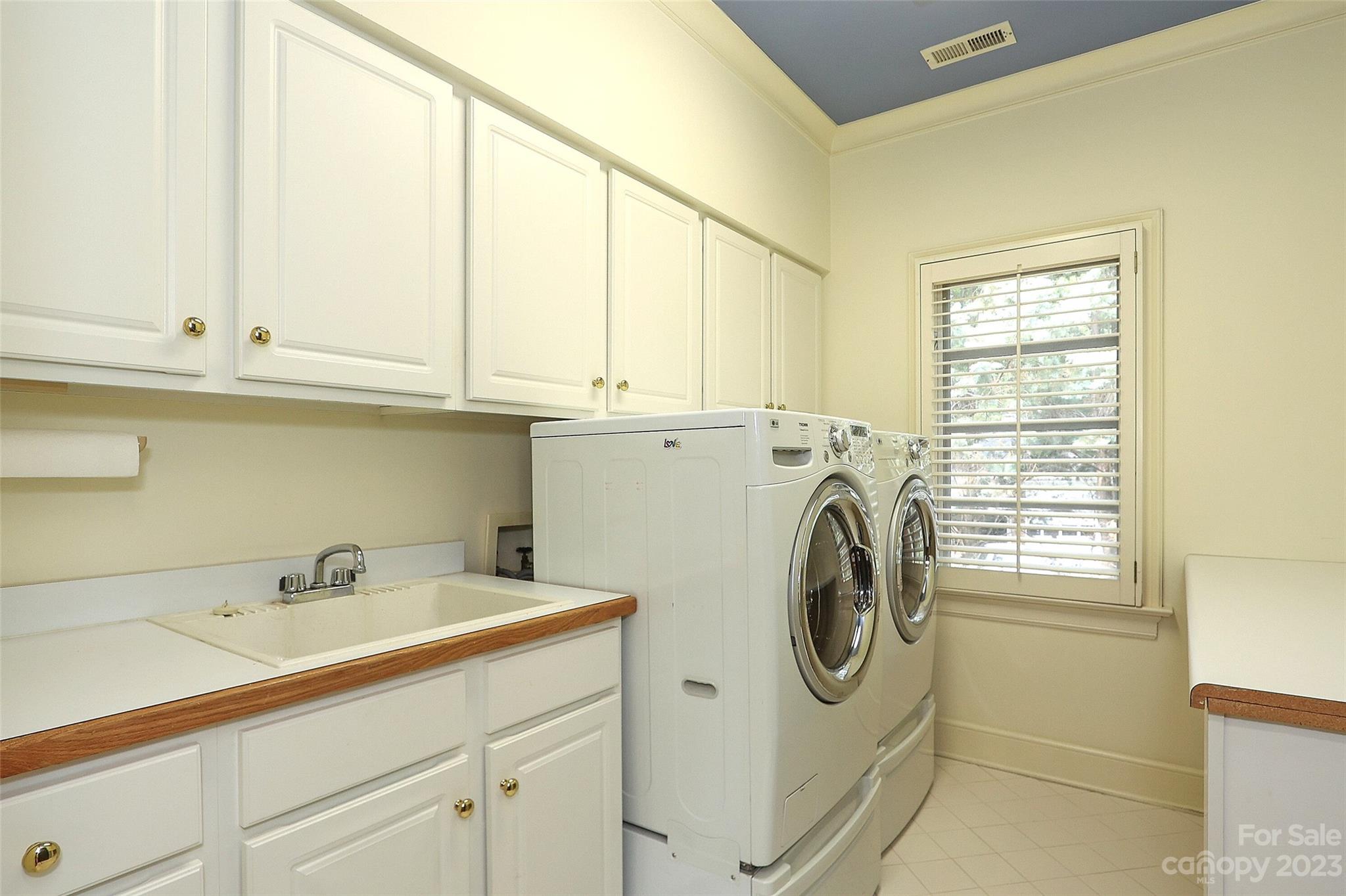 2416 Warburton Road Charlotte, NC 28211 - Photo 34 of 46 a utility room with dryer and washer