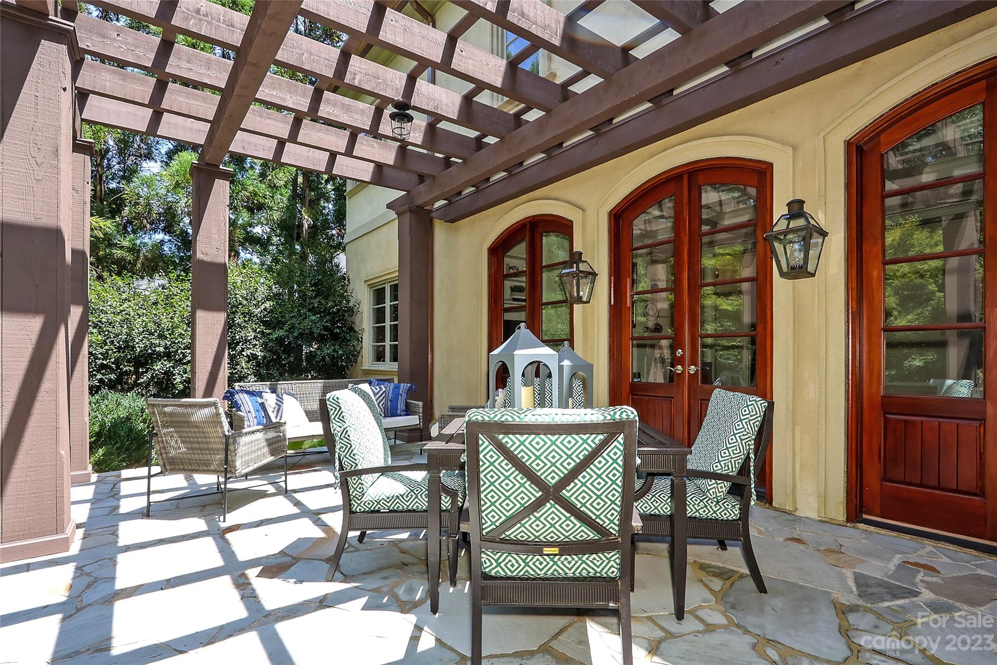 2416 Warburton Road Charlotte, NC 28211 - Photo 37 of 46 a view of a dining room with furniture wooden floor and a potted plant