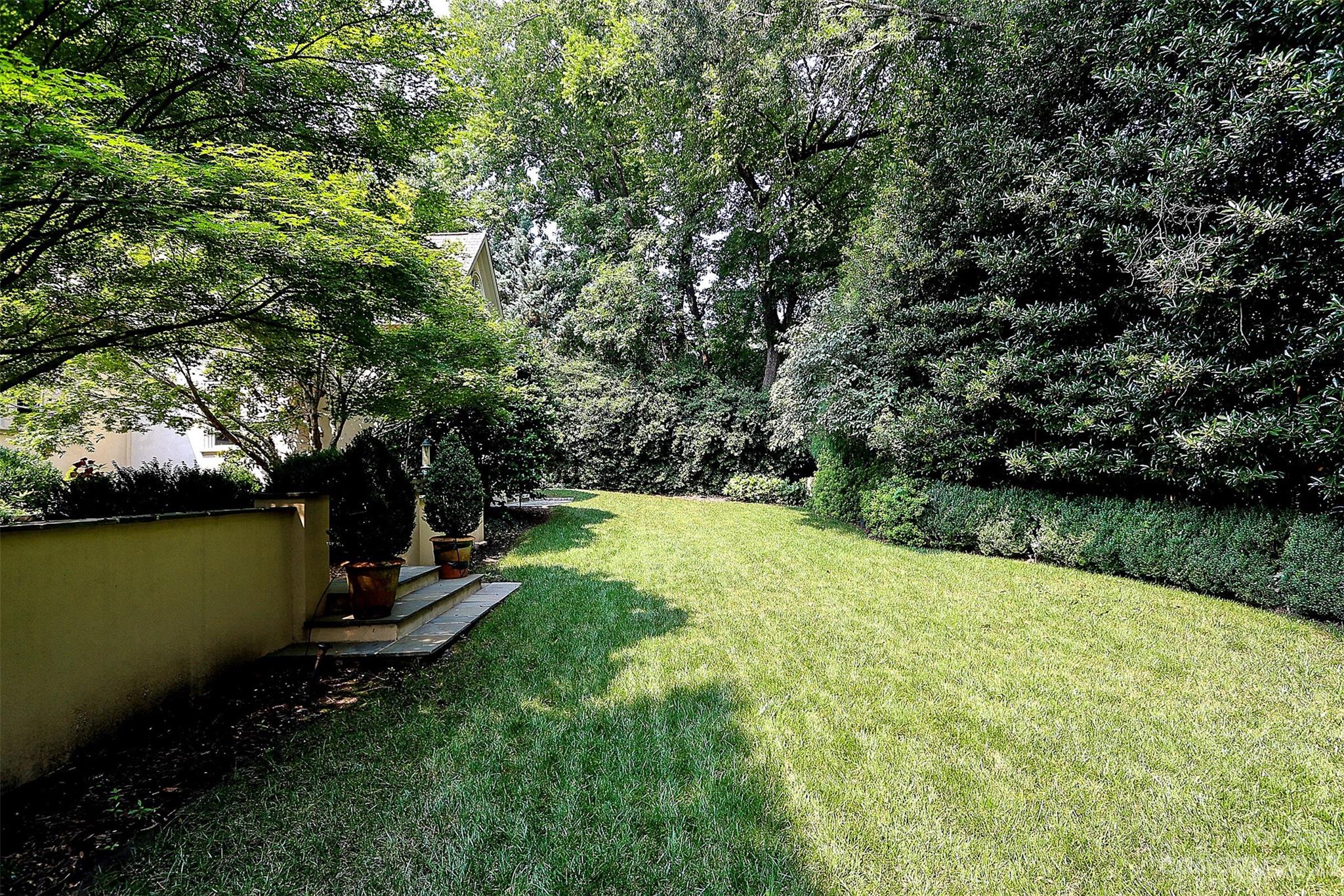 2416 Warburton Road Charlotte, NC 28211 - Photo 39 of 46 a view of a backyard with a lake view
