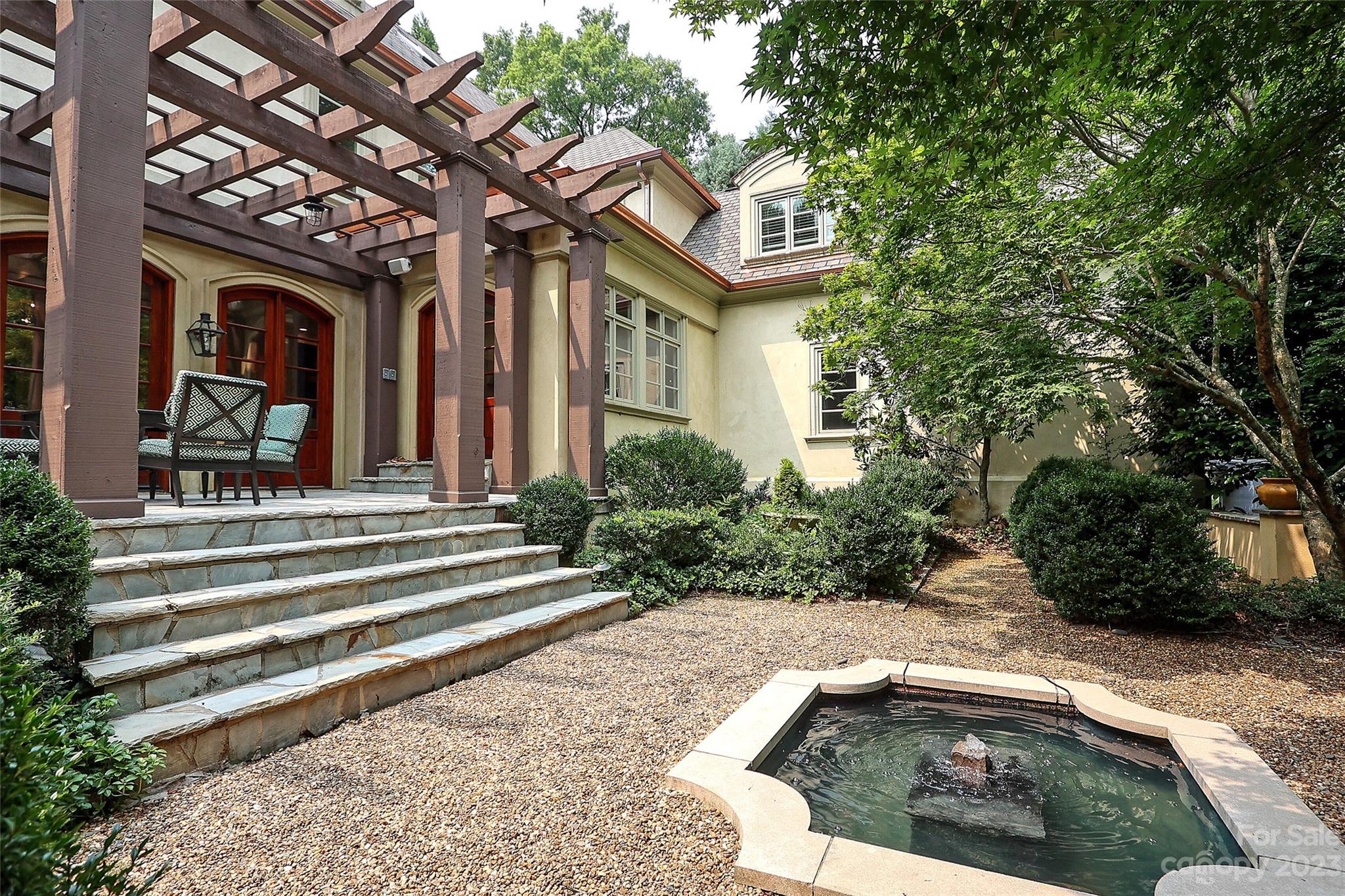 2416 Warburton Road Charlotte, NC 28211 - Photo 41 of 46 a front view of a house with a yard