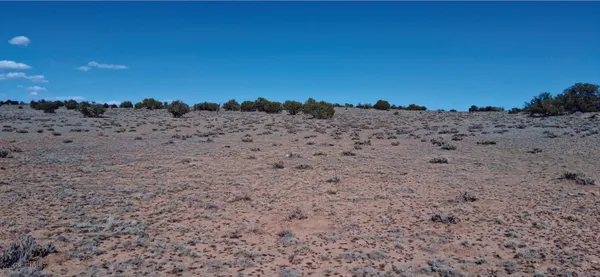 a view of beach and mountain