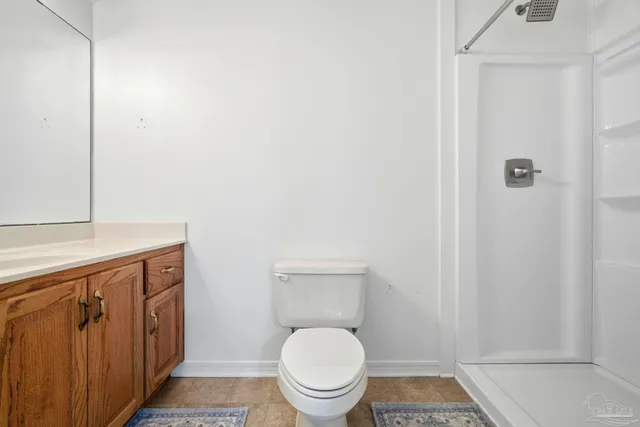 a bathroom with a toilet and a sink