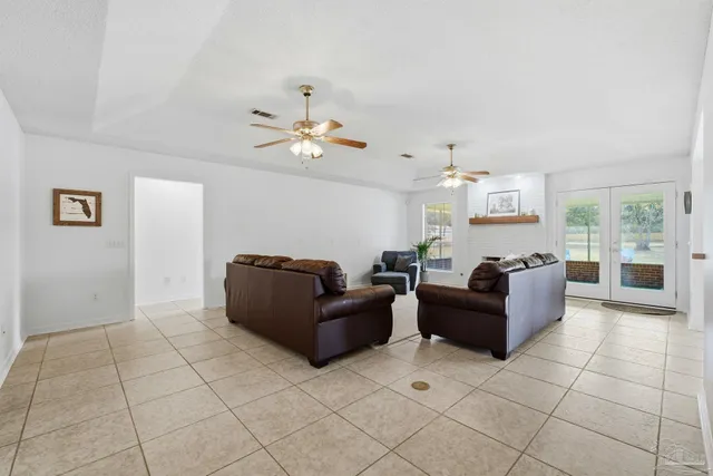 a living room with furniture and a window