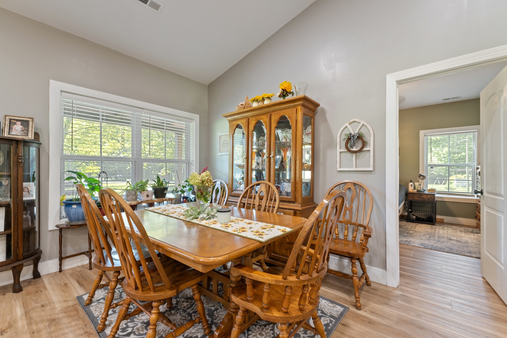 232 Clyde Vickers Road Estill Springs, TN 37330 - Photo 13 of 25 a view of a dining room with furniture window and wooden floor