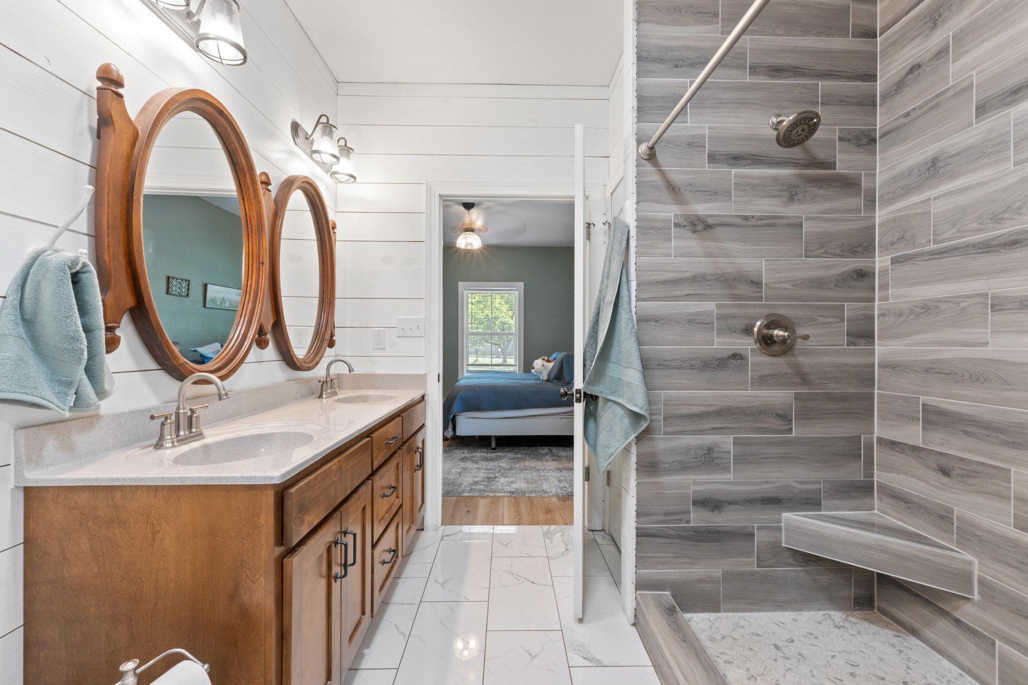 232 Clyde Vickers Road Estill Springs, TN 37330 - Photo 15 of 25 a bathroom with a sink and a mirror