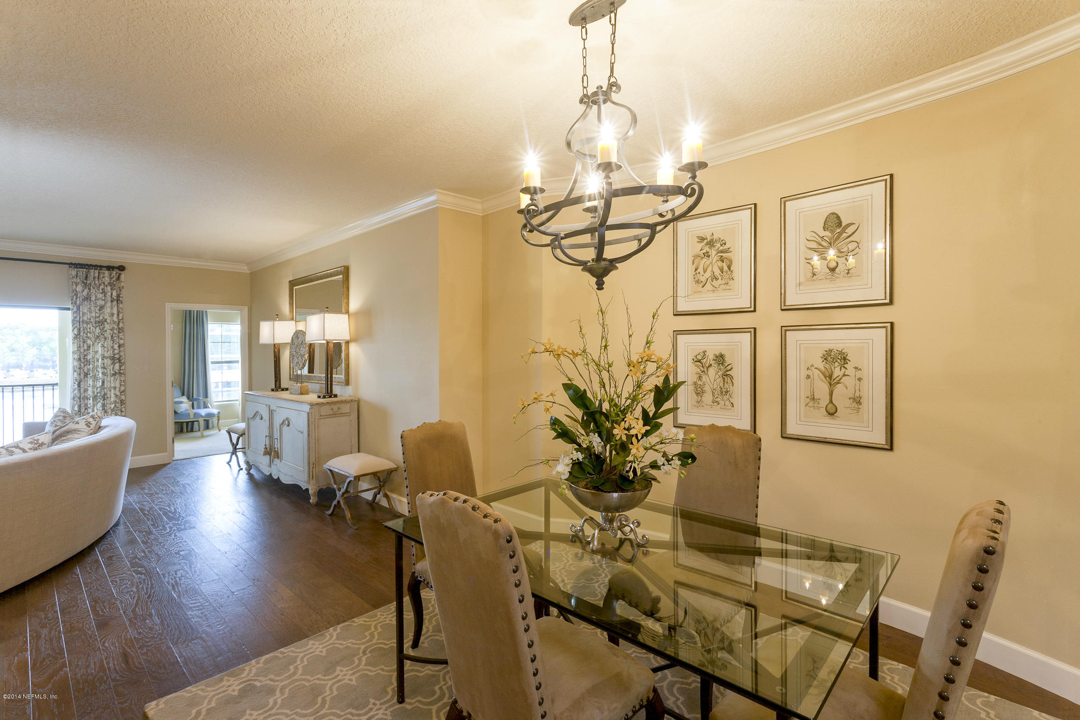 3958 Baymeadows Road, Unit 2202 Jacksonville, FL 32217 - Photo 4 of 9 a view of a dining room with furniture window and wooden floor