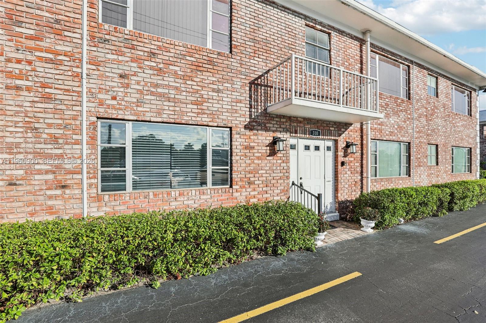 310 South Cypress Road, Unit 730 Pompano Beach, FL 33060 - Photo 2 of 26 front view of a house