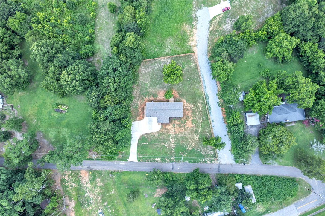 108 Old River Road Iva, SC 29655 - Photo 30 of 31 An aerial perspective reveals a secluded home nestled among verdant trees and ample green space.