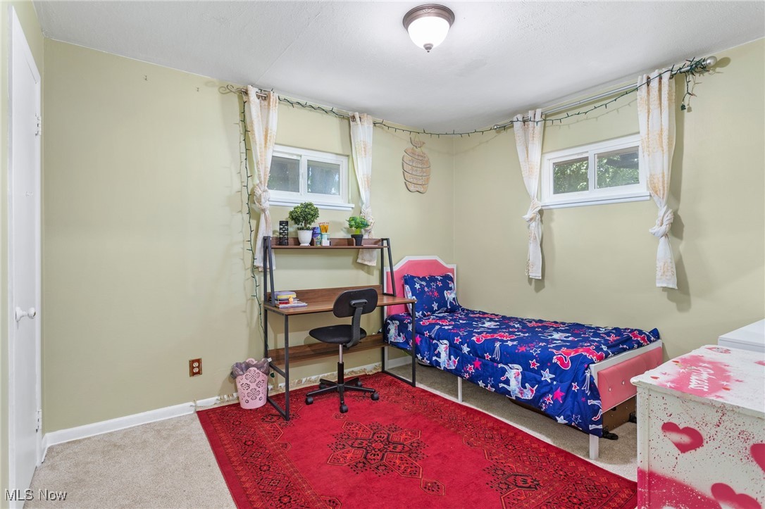 12972 West Sprague Road Cleveland, OH 44130 - Photo 14 of 23 Carpeted bedroom featuring baseboards
