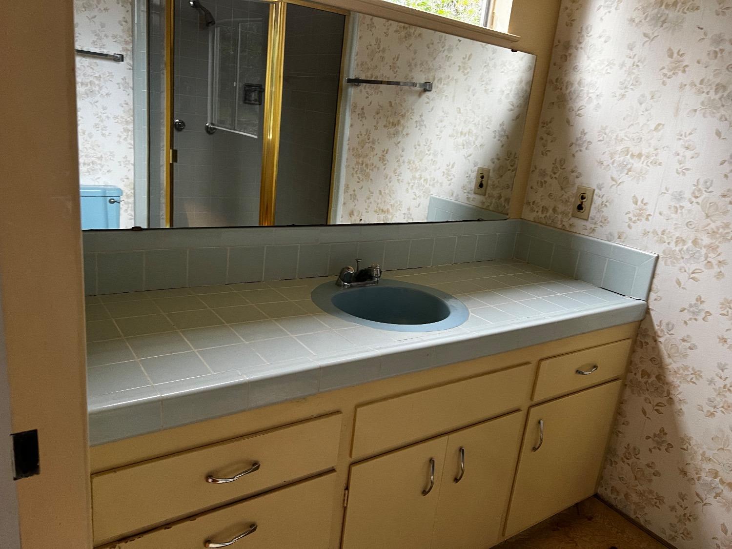 3194 Surmont Drive Lafayette, CA 94549 - Photo 16 of 40 a bathroom with a sink and a mirror