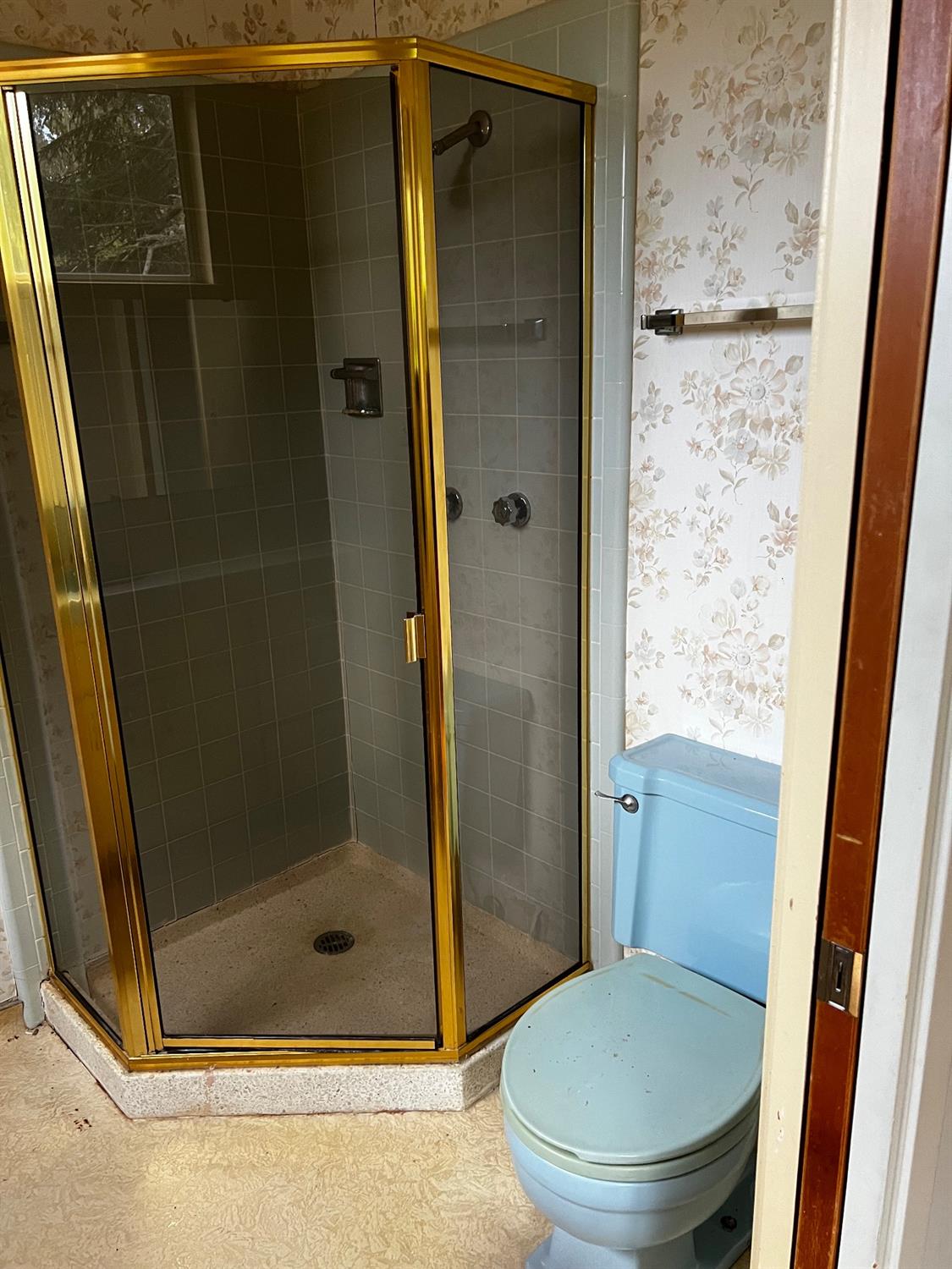 3194 Surmont Drive Lafayette, CA 94549 - Photo 17 of 40 a bathroom with a glass door shower and toilet
