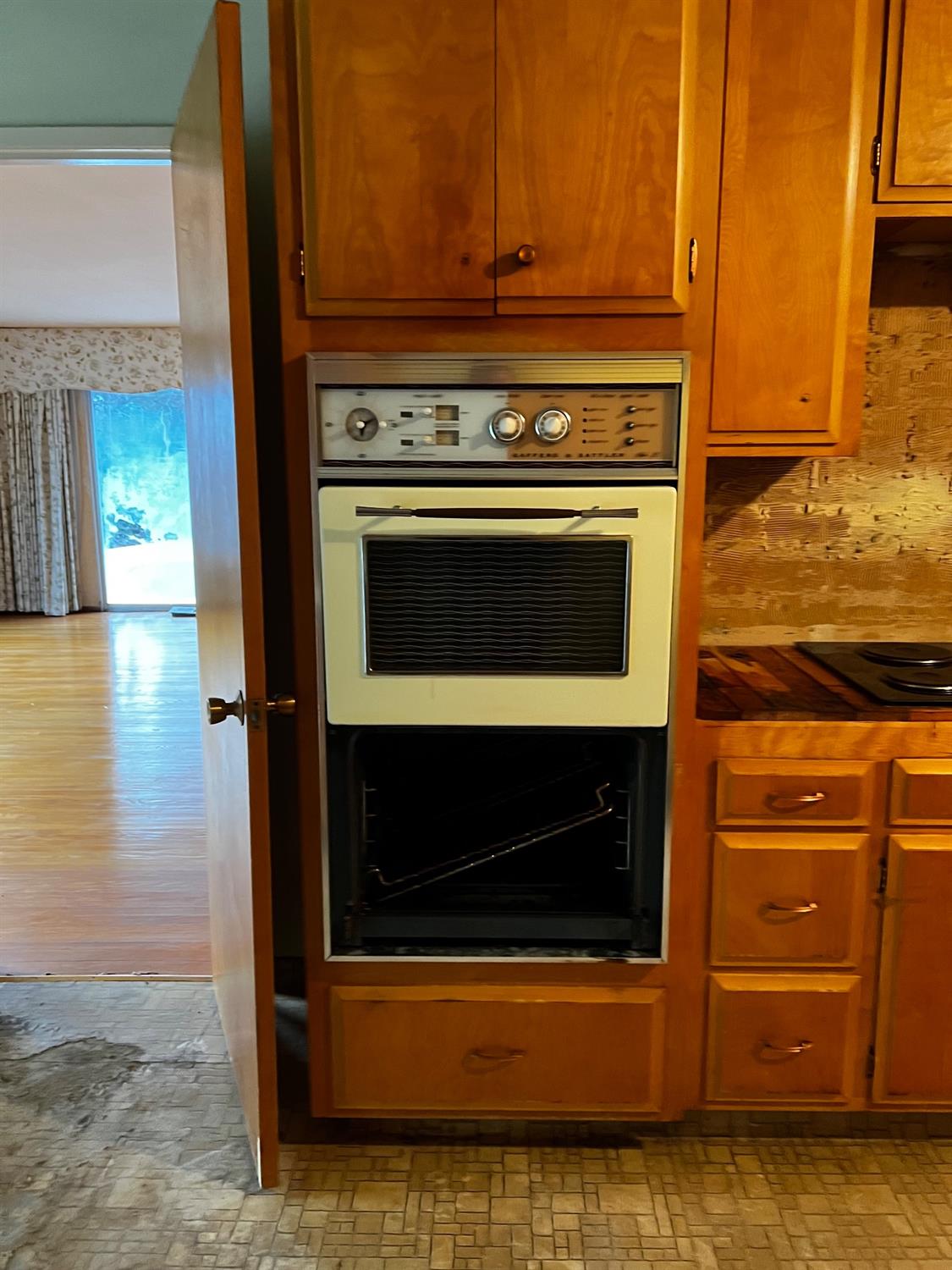 3194 Surmont Drive Lafayette, CA 94549 - Photo 29 of 40 a stove top oven sitting inside of a kitchen