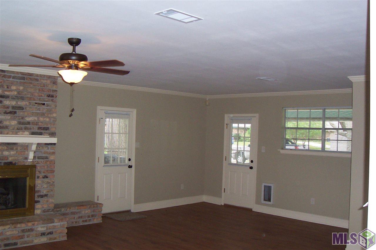 2468 Seracedar Street Baton Rouge, LA 70816 - Photo 5 of 16 Family room opens to covered parking and covered patio