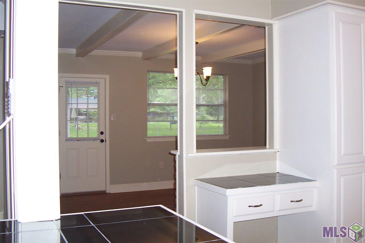 2468 Seracedar Street Baton Rouge, LA 70816 - Photo 6 of 16 The family room is open to the kitchen