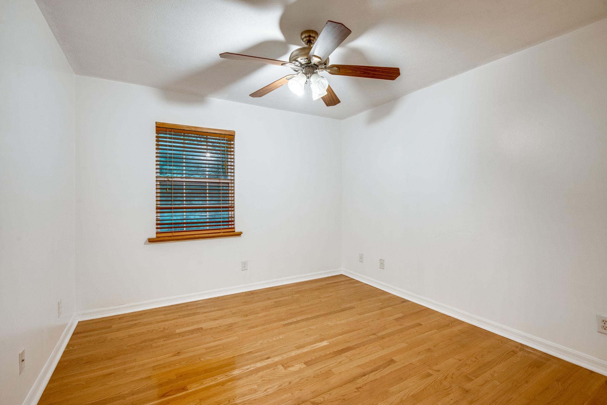 549 Porter Hollow Road Linden, TN 37096 - Photo 19 of 30 Bedroom 4 upstairs. Upstairs bedrooms all have beautiful hardwood flooring.