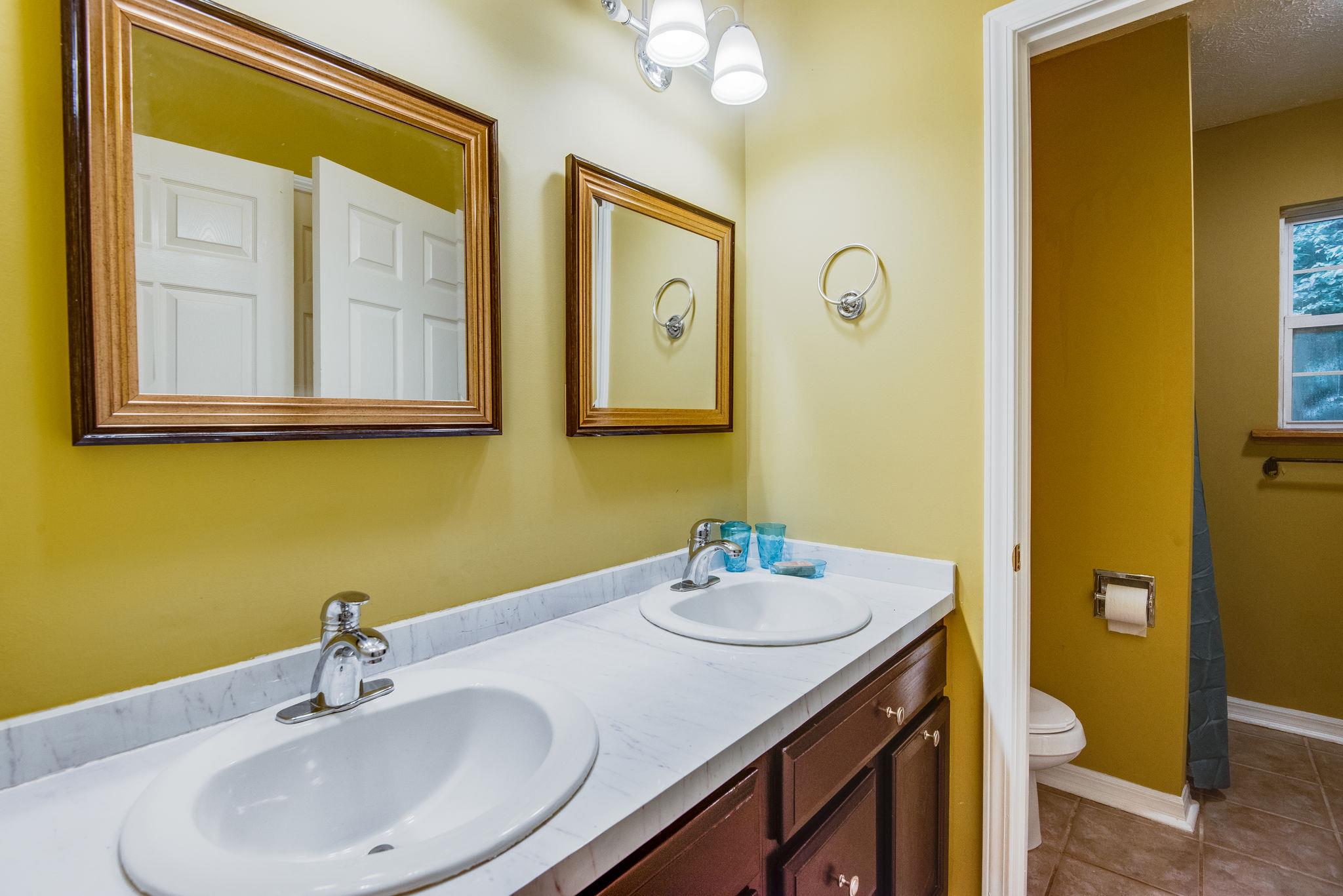 549 Porter Hollow Road Linden, TN 37096 - Photo 24 of 30 Upstairs bath features double vanities.