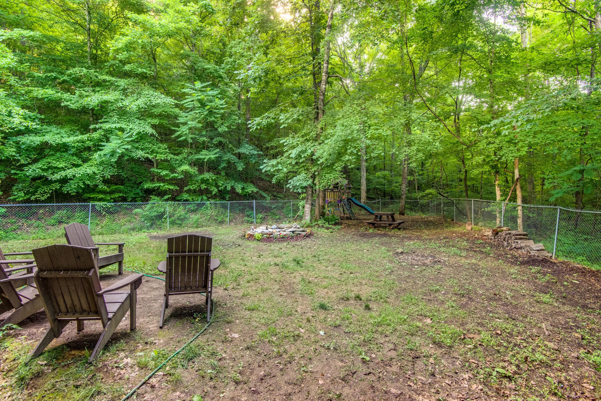 549 Porter Hollow Road Linden, TN 37096 - Photo 26 of 30 Backyard is surrounded by thick forest for unimaginable privacy.