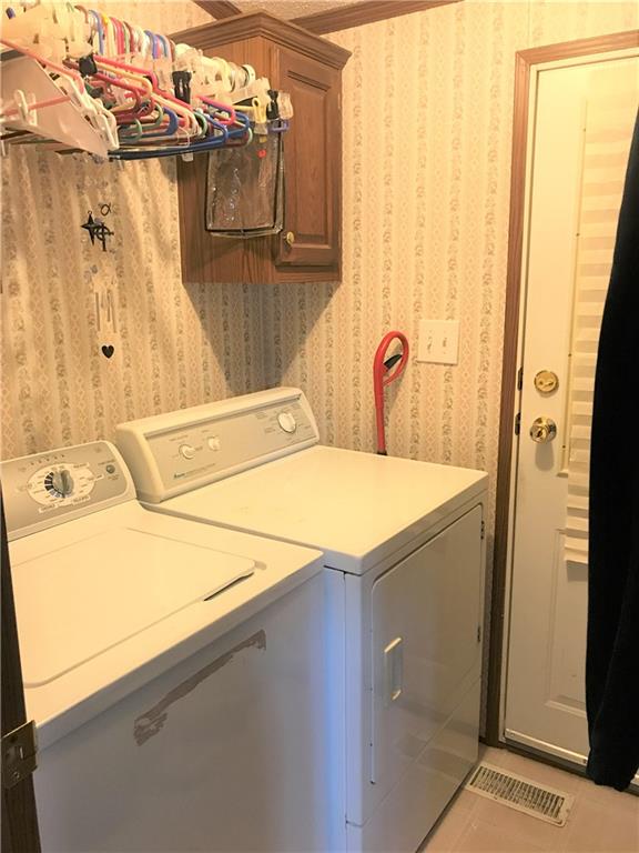 502 Amy Lane Rochester, PA 15074 - Photo 12 of 14 Laundry - there's a sink and more cupboards to the right.
