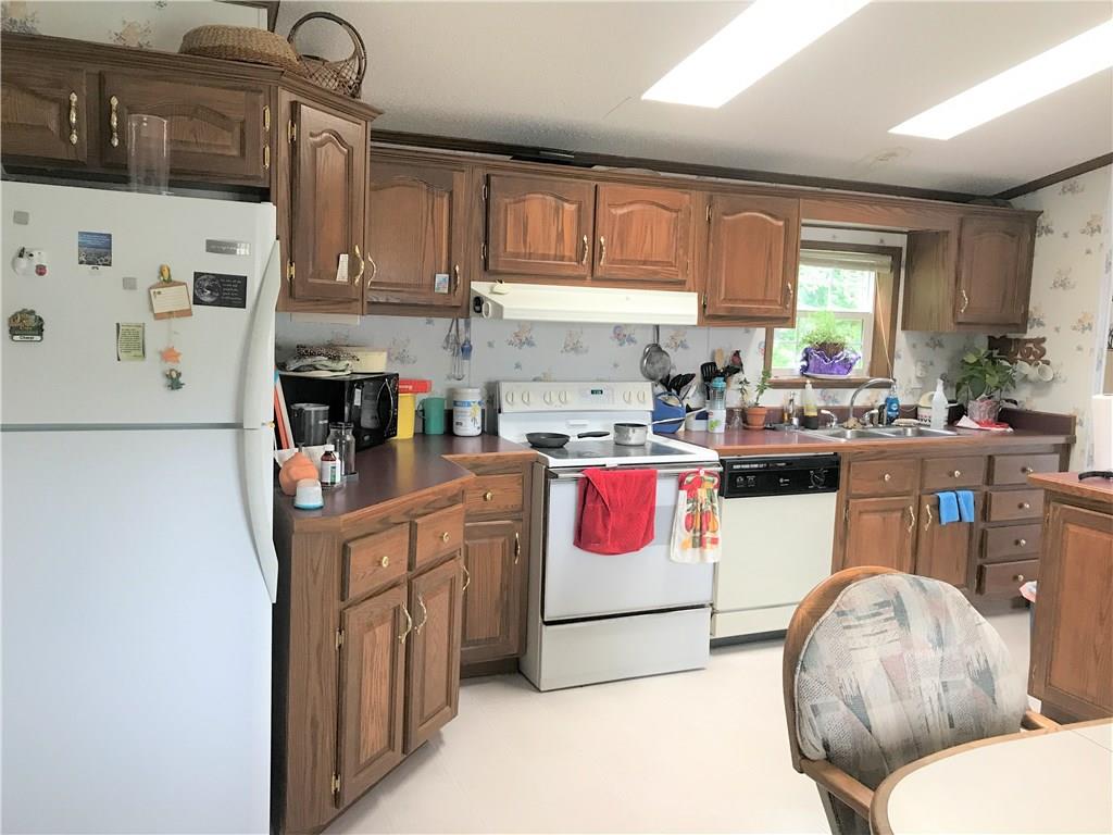 502 Amy Lane Rochester, PA 15074 - Photo 4 of 14 Refrigerator, stove, dishwasher & microwave are included.