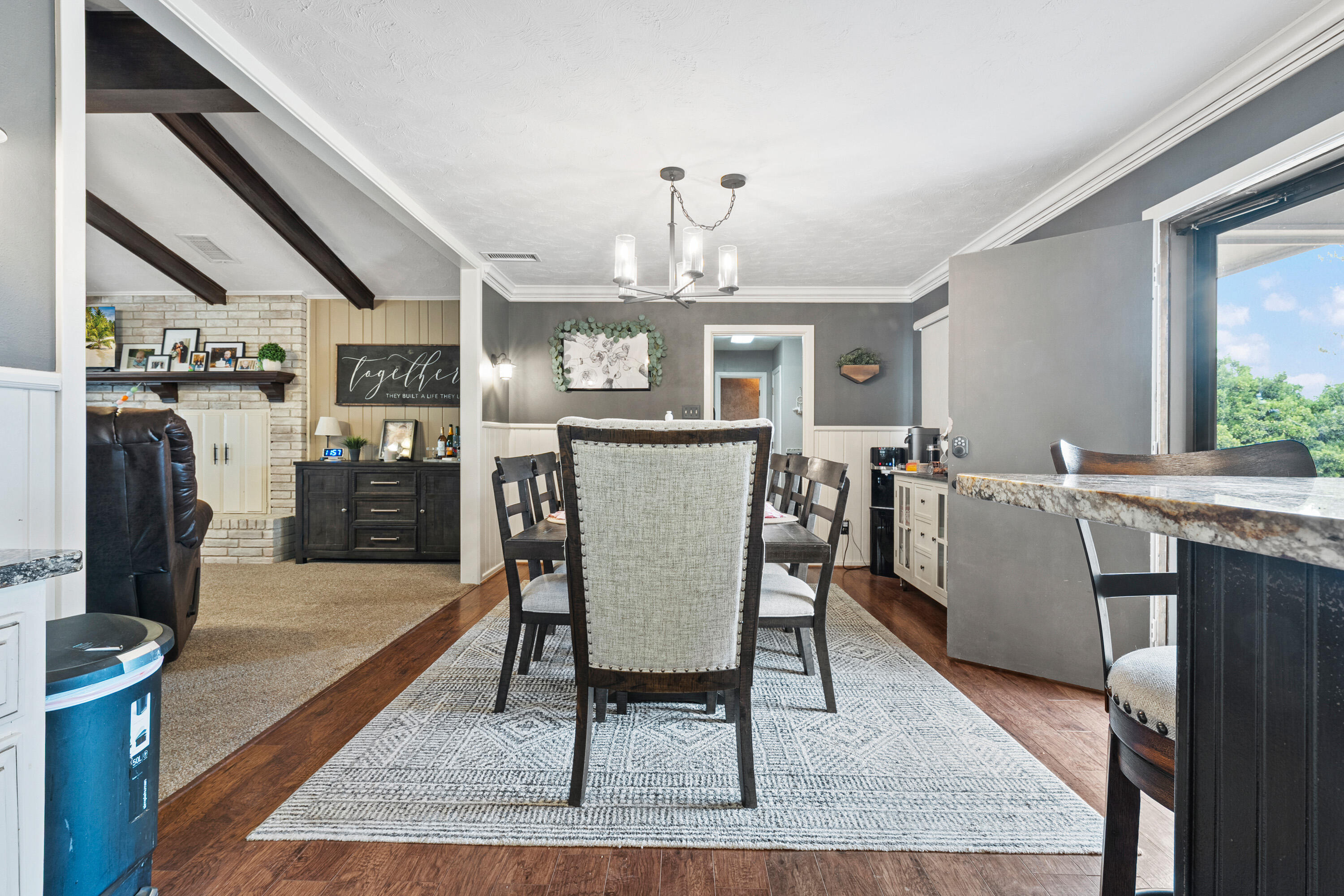 1304 Ave J Ralls, TX 79357 - Photo 14 of 32 a view of a dining room with furniture and wooden floor