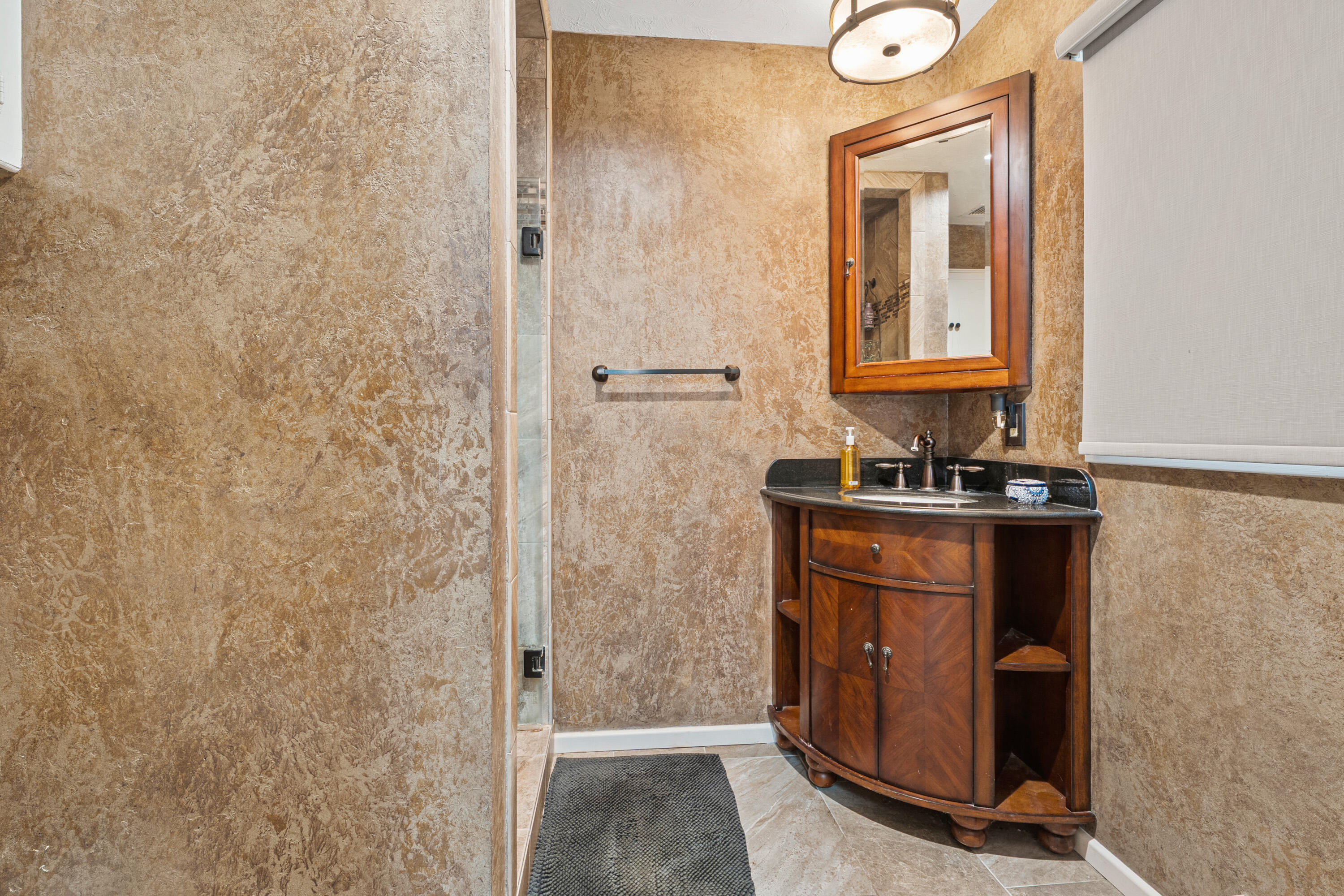 1304 Ave J Ralls, TX 79357 - Photo 16 of 32 a bathroom with a sink and a mirror