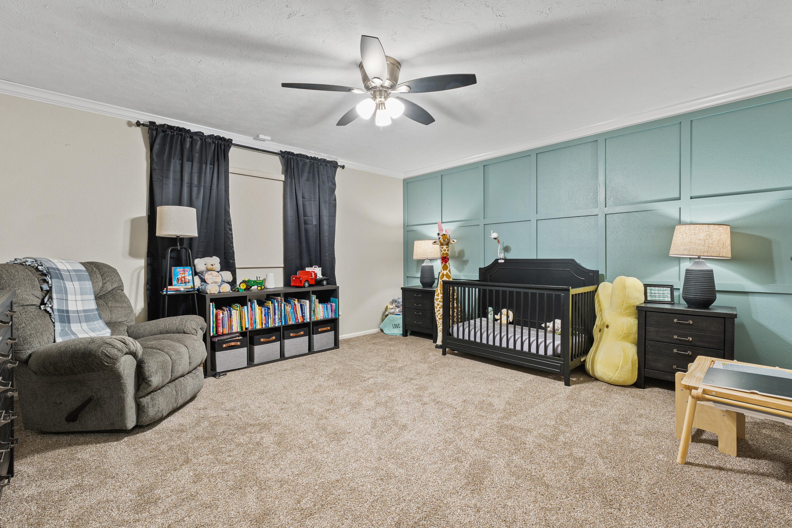 1304 Ave J Ralls, TX 79357 - Photo 20 of 32 a bedroom with furniture and a lamp