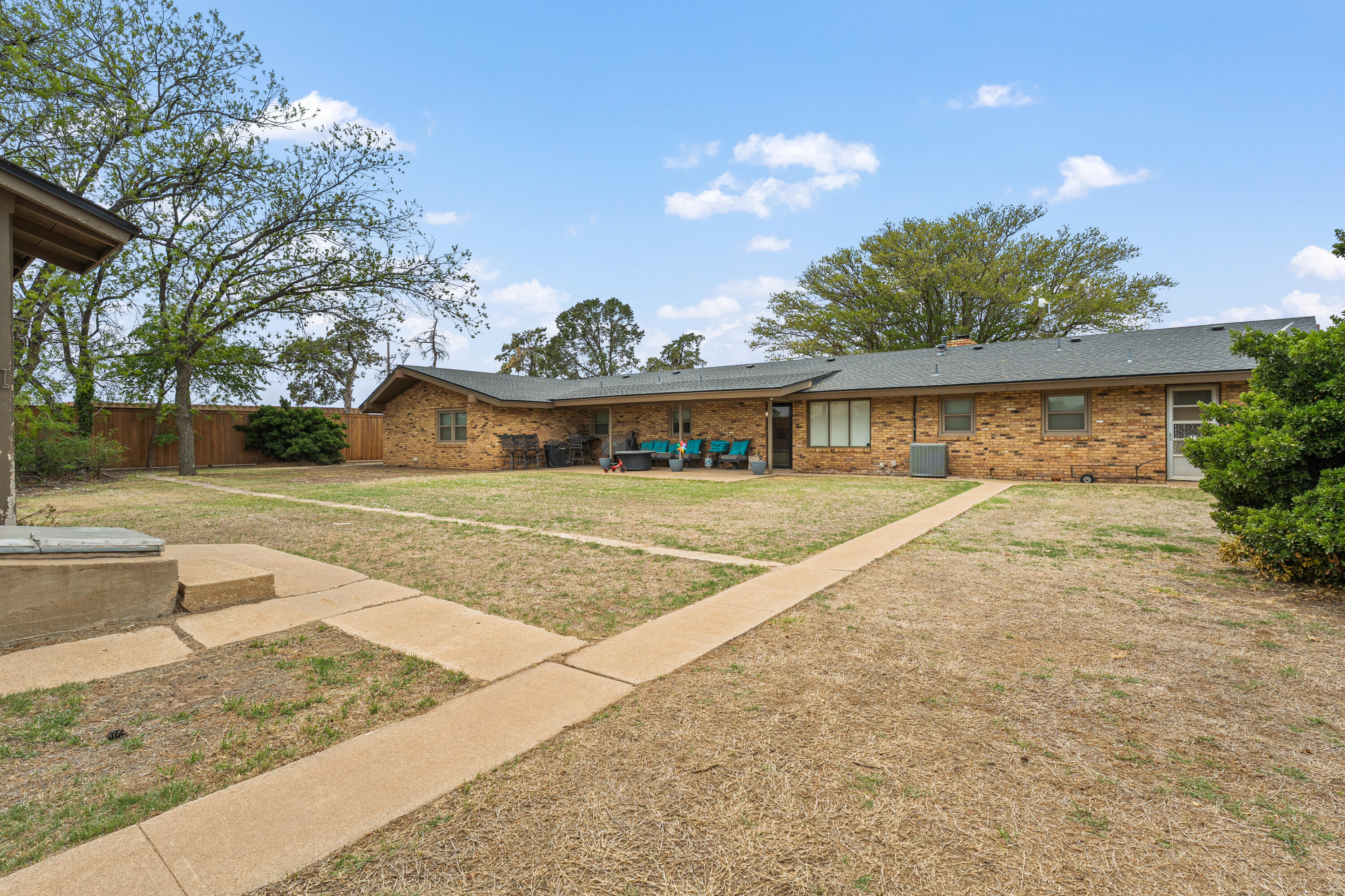 1304 Ave J Ralls, TX 79357 - Photo 30 of 32 a front view of a house with garden