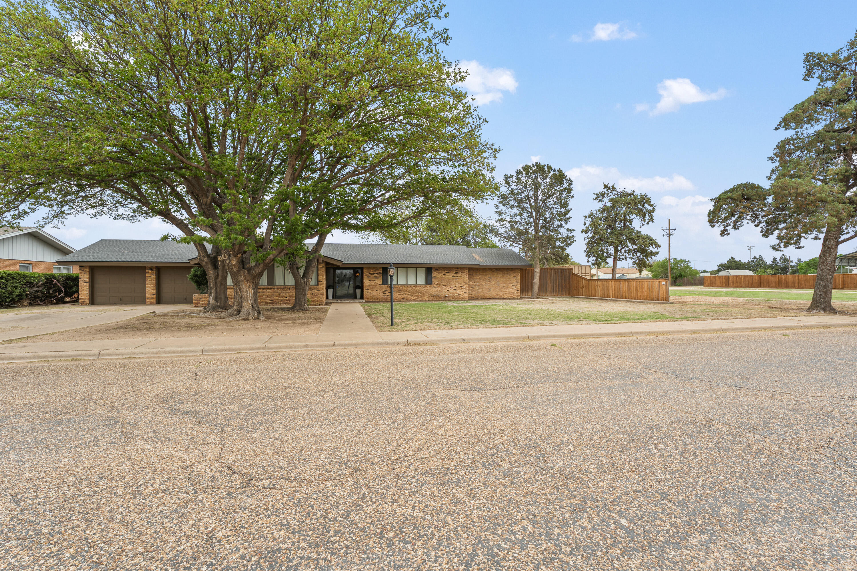 1304 Ave J Ralls, TX 79357 - Photo 31 of 32 front view of a house with a garden